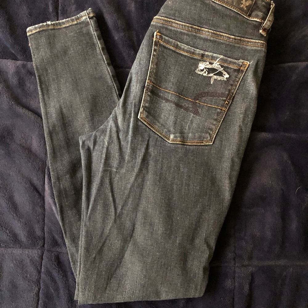 Dark blue distressed super skinny jeans